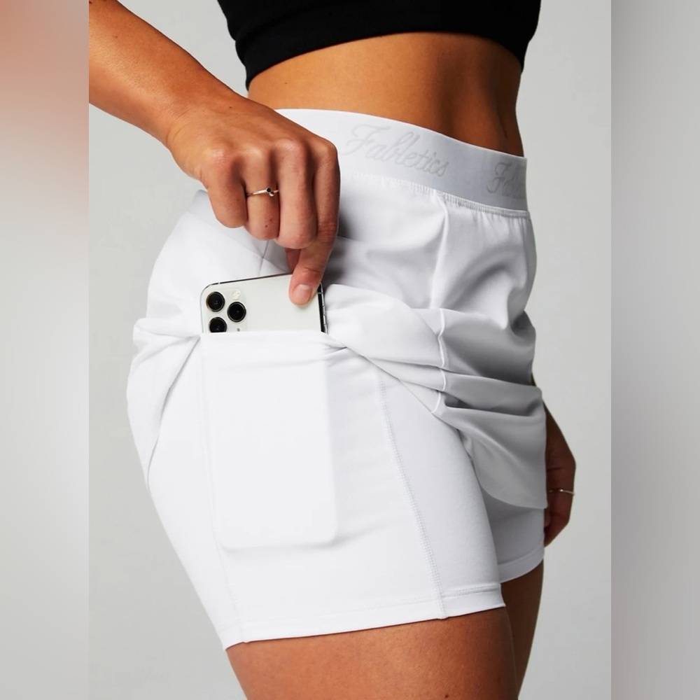 Women’s white Fabletics skort.